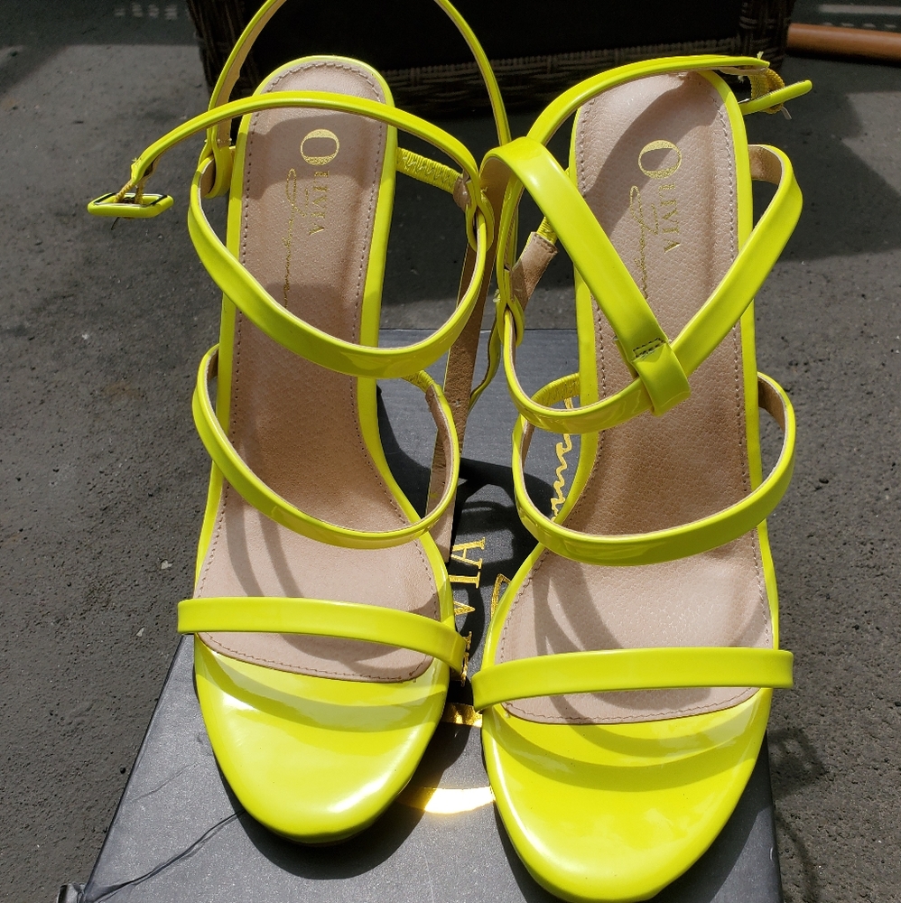 Neon yellow patent heels
